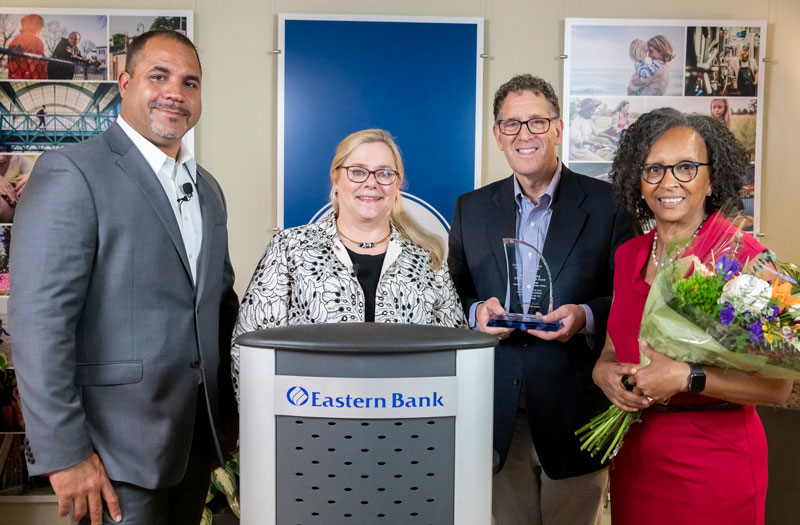 From left to right, Quincy Miller, Eastern Bank Vice Chair and President; Nancy Huntington Stager, Eastern Bank Foundation President and CEO; Steve Saltzman, New Hampshire Community Loan Fund President and CEO; and Debby Miller Community Loan Fund Executive Vice President of Strategic Partnerships and Philanthropy.